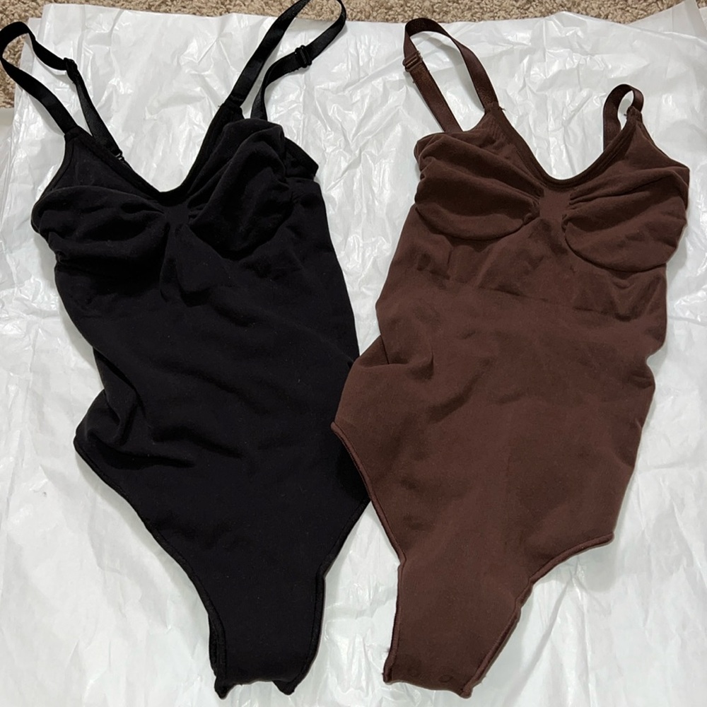 SKIMS Black and Brown Bodysuits